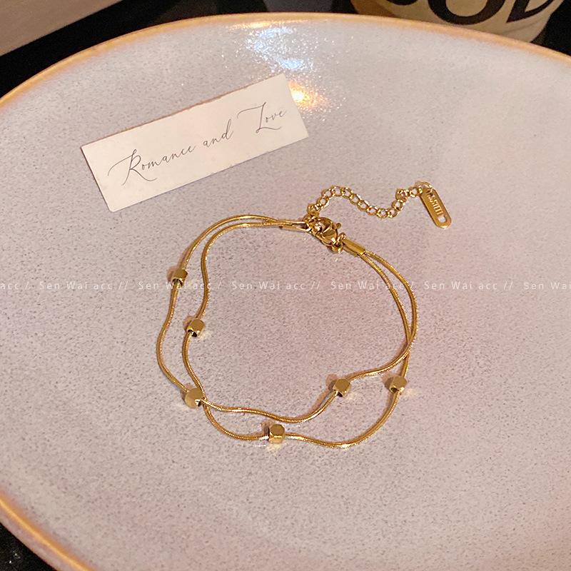 

European and American retro heart-shaped shell wheat ear titanium steel bracelet women s light luxury high-end jewelry fashion accessories