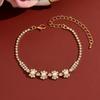 In-Stock Eco-Friendly Korean Style Pearl Flower Bracelet: Elegant, Adjustable Rhinestone Claw Chain for Women