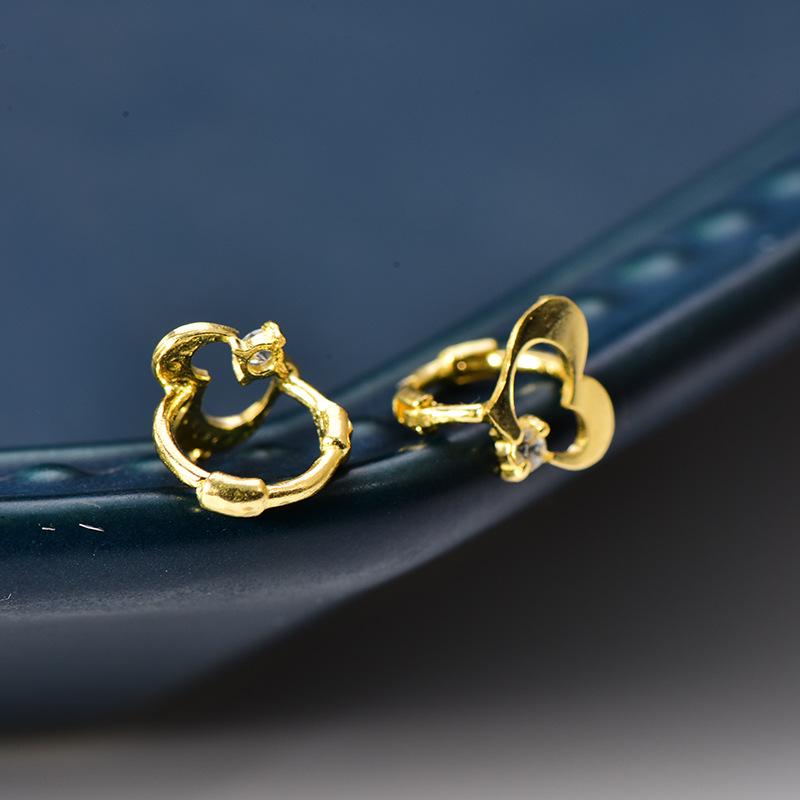 Modische und exquisite hohle Liebes-Ohrstecker mit Diamanten für Damen, trendige Sommergeschenke