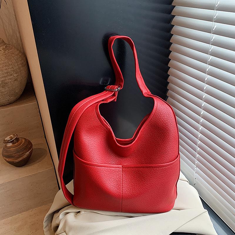 Casual large-capacity bag women's new fashion commuter shoulder messenger bag popular retro bucket bag