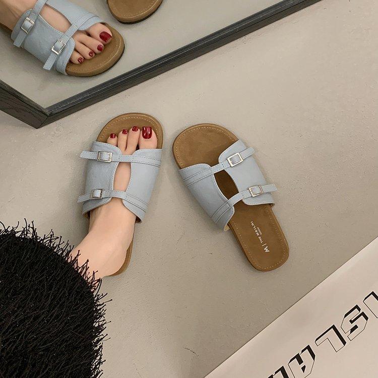 Pantoufles françaises à une pédale pour femmes 2025 nouvel été extérieur à semelle plate pantoufles à un mot double boucle plage cool pantoufles femmes