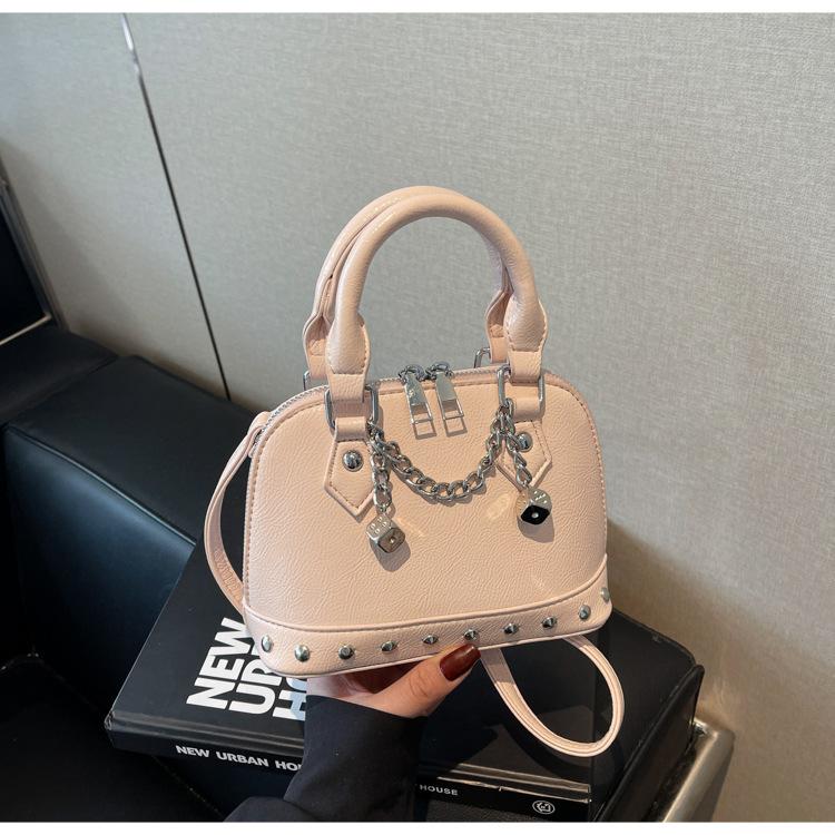 Popular portable shell small bag women's 2025 new high-end rivet saddle bag fashionable shoulder messenger bag