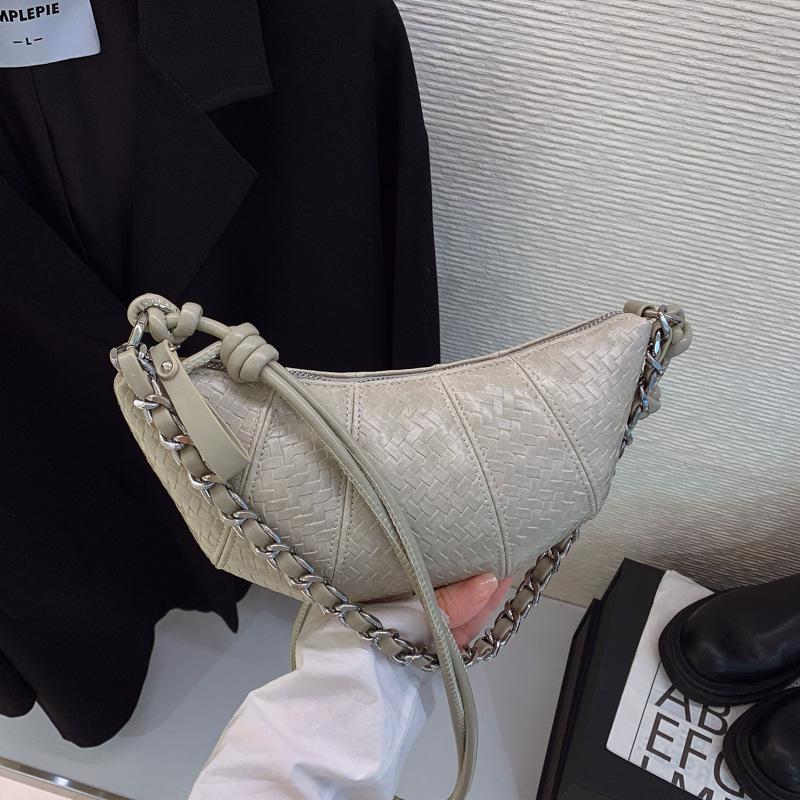 

Premium texture bag women s summer new niche design messenger horn bag net versatile dumplings покинуть белый