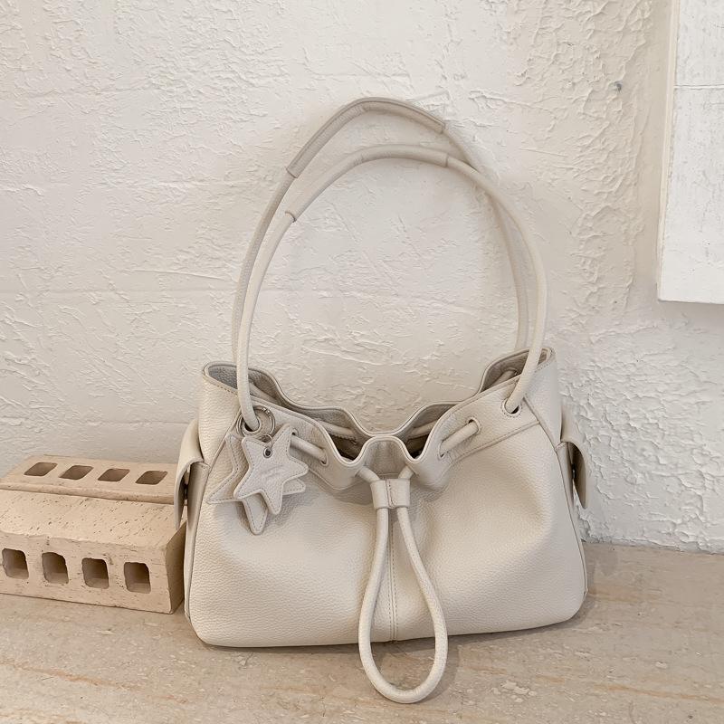 

Unique design drawstring bucket bag for women2026New large-capacity handbag tote bag for casual work and commuting білий