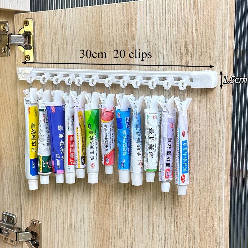 

Cream Storage Rack No Drilling for Wall Hanging Tube Shaped Cream Drug Slide Clamp Household Emergency Medicine Storage Rack