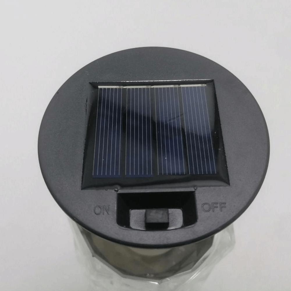 Torche Flamme Réaliste Alimentée à l'Énergie Solaire Flamme Vacillante Lumière Solaire Flamme Chargement Automatique Capteur Marche/Arrêt Automatique