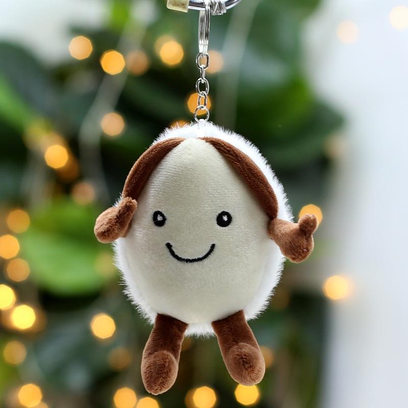 

Новая плюшевая игрушка Кулон-каштан Кукла Кукла Брелок в виде семечки дыни Украшение для сумки Тряпичная кукла 10Cm