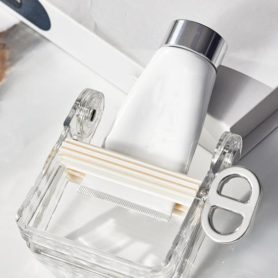 Rolling Toothpaste Squeezer with Rotatable Handle Bathroom Toothpaste Seat Holder Stand Organizer Countertop Tube Extruder Dispenser Squeezing Tool