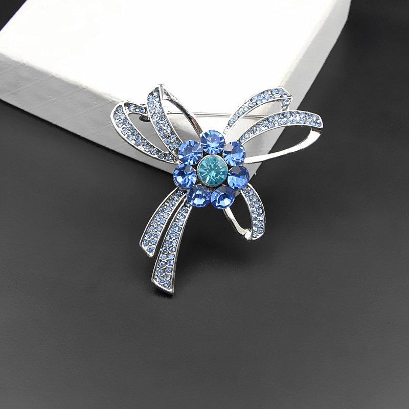Elegant Austrian Crystal Bow Tie Brooch: Simple Alloy Lapel Pin & Scarf Buckle Accessory.