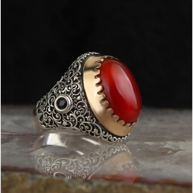 

Carved multi-color oval ring. Unique charm for Christmas and New Year celebrations. No. 6