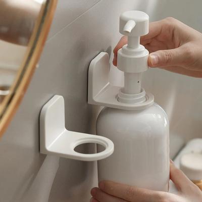 Perchero de pared con ganchos adhesivos para baño, sin marcas de uso.