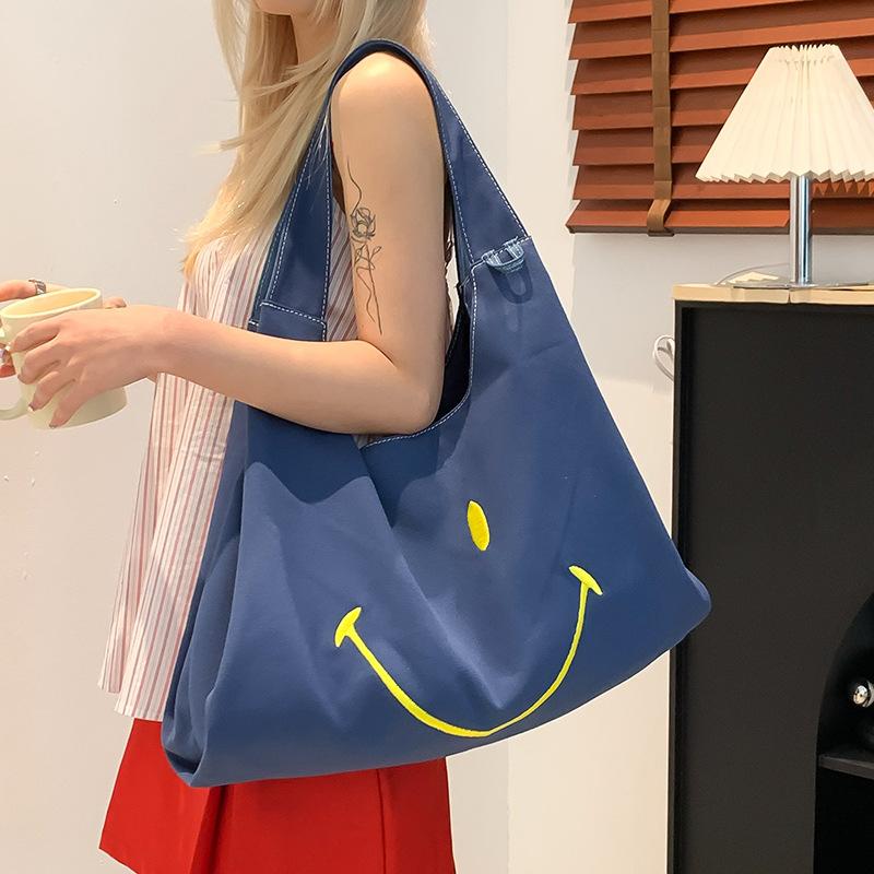 Spring and summer niche design embroidered smiley shopping bag tote bag women's versatile commuter large capacity shoulder bag