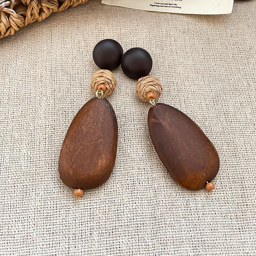 Silver Needle Wooden Raffia Oval Earrings: Ethnic Style, Retro Elegance, Unique Personality for Women.