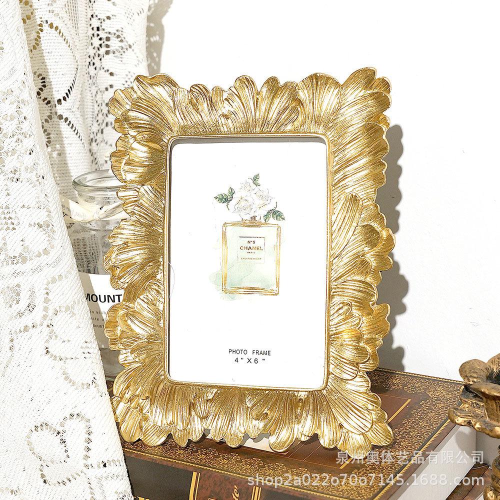 Moderne Schlichtheit 6 Zoll Feder-Fotorahmen Tischdekoration Bilderrahmen Goldener Harz-Fotorahmen Heimdekor Ornament