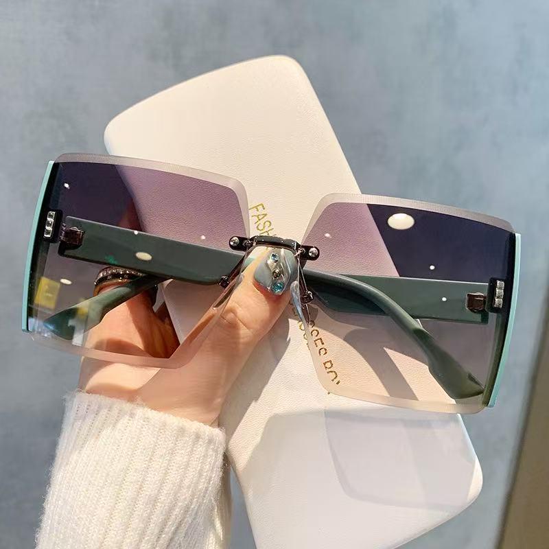 "Rahmenlose, große, schmale Sonnenbrille Emma für Damen – Geschliffene Kanten, Sonnenschutz, trendige High-End-Brille"