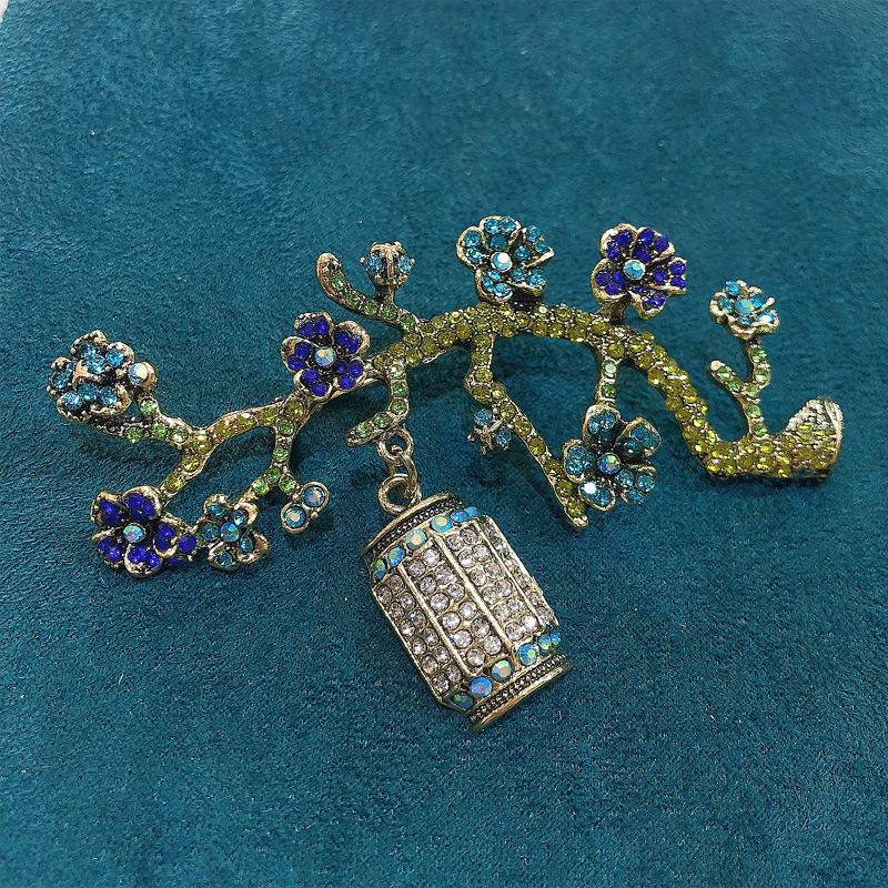 Vintage Rhinestone Plum Blossom Brooch: Women's Floral Lantern Corsage Accessory