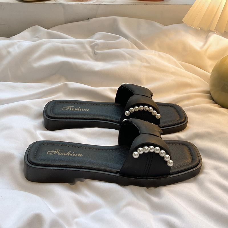 

Жемчужные Сяосянфэн верхняя одежда женские шлепанцы на плоской подошве летний стиль универсальные пляжные нескользящие тонкие женские шлепанцы с мягкой подошвой 40-41 [one size smaller] чёрный