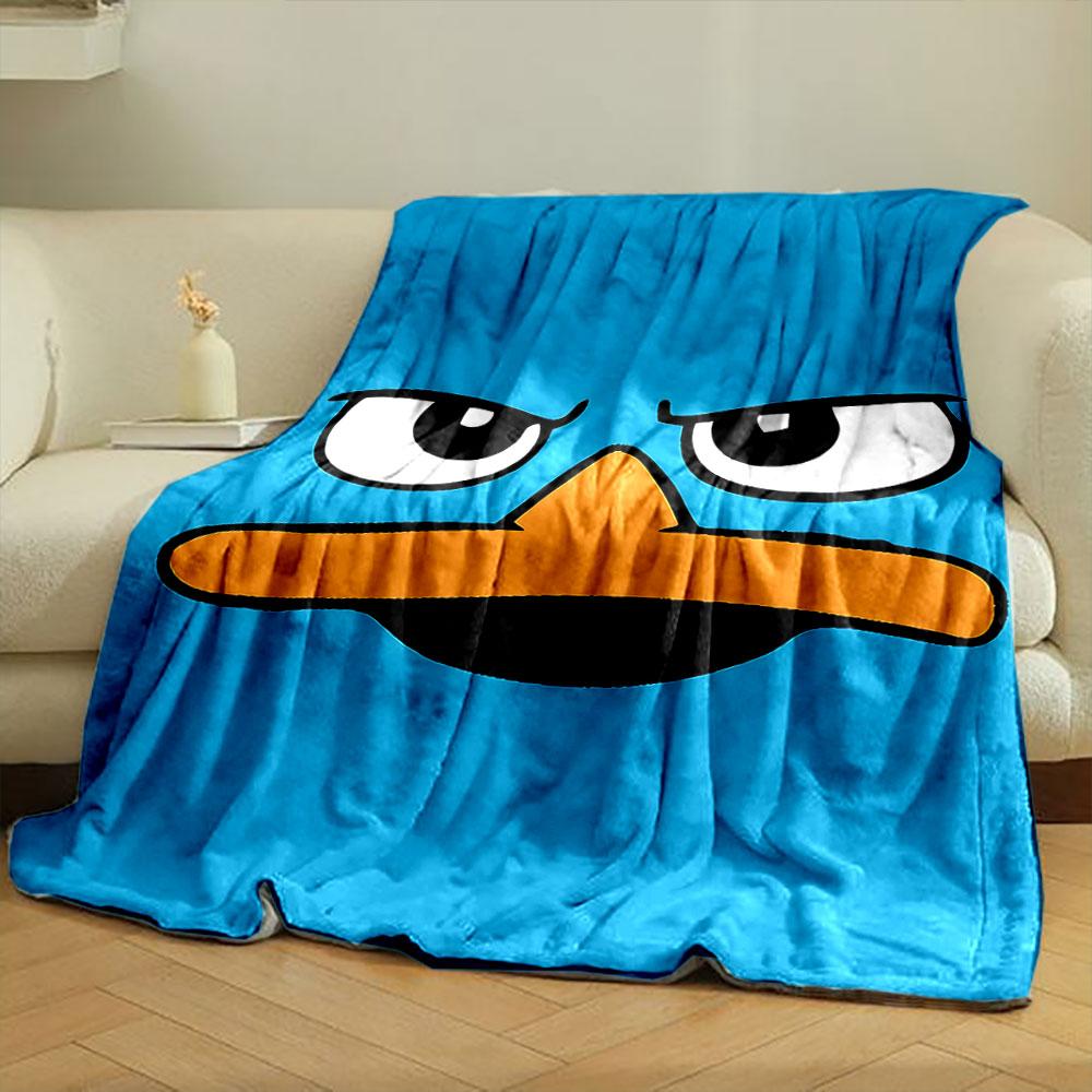 Stylized blue cartoon face with sharp eyes and an orange beak. for all seasons blanket lunch break throw gift
