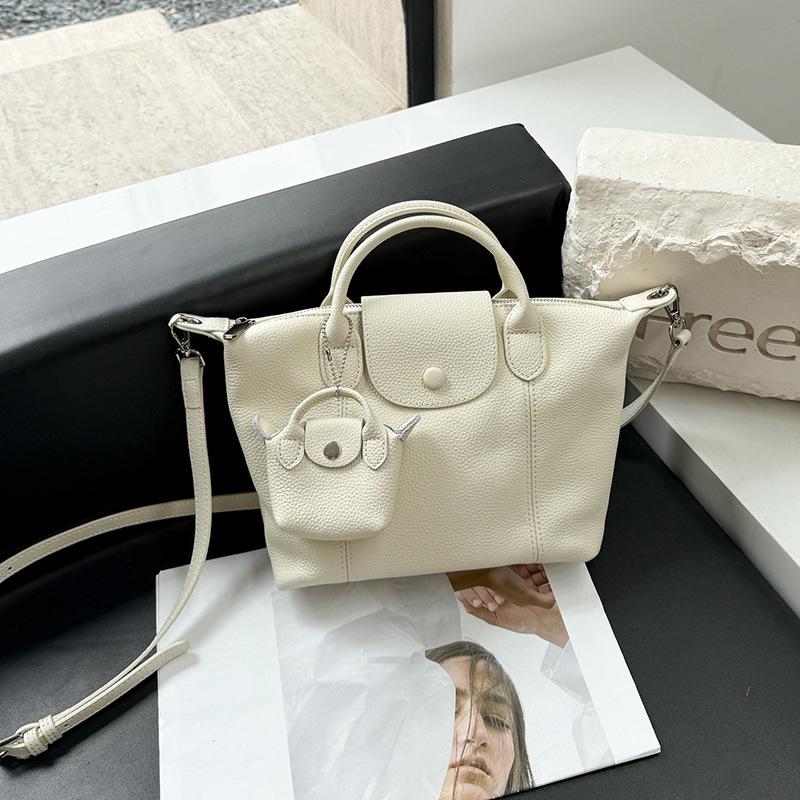 

Вместительная женская сумка-пельмень из натуральной кожи, сумка через плечо на одном плече