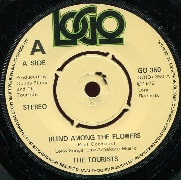 

7-дюймовая пластинка TOURISTS Blind Among The Flowers GO350 Логотип 1979 Великобритания Рок Б/у