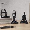 Zeitgenössische Innenraumakzente 3-teiliges Abstraktes Yoga-Figuren-Skulpturen-Set, Hohlkörper-Tänzerin mit Glänzendem Gold Mattem Silber Schwarz Luxuriöse Harz-Handwerkskunst