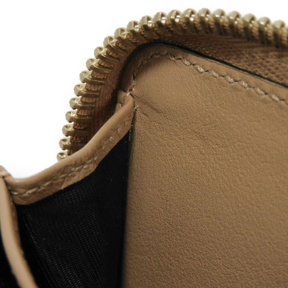 Used Guccissima Coin Purse 9539 544249 BMJ1G 2754 7943 with Embossed Double G Logo and Zip Around Closure, Micro GG