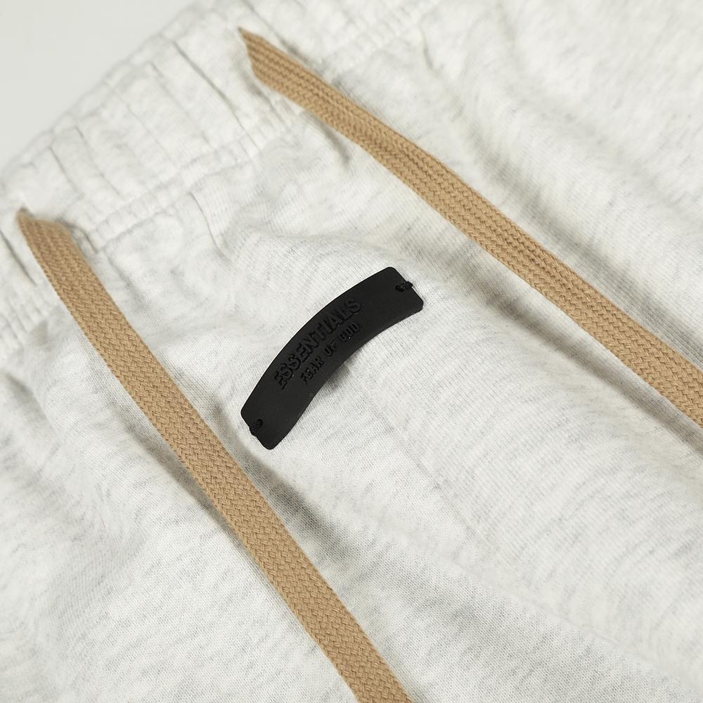 538 Unisex Fear Of God Essentials Pantaloni della tuta con stampa di lettere Gamba dritta larga Coulisse Pantaloni jogger Streetwear Pantaloni casual per uomo donna