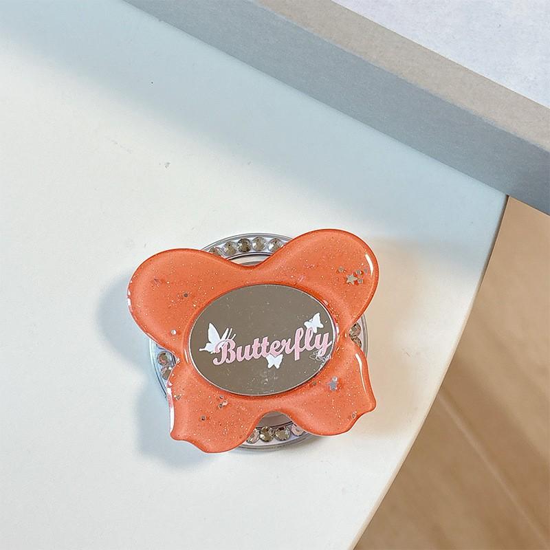

Sparkling Butterfly Oval Mirror Mobile Airbag Holder Magnetic Suction Retractable Ring Wholesale Internet Famous Women s Makeup Repair