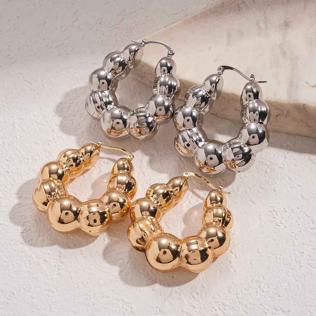 Metal light-sensitive surface geometric round U-shaped ear buckle niche environmentally friendly fashion earrings