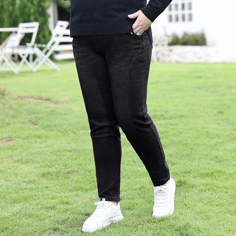 Jeans elasticizzati taglie forti Pantaloni larghi da donna con cavallo sottile e coscia larga Harun spessi