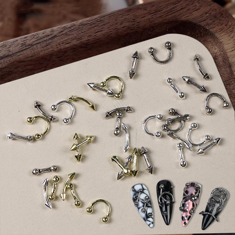20 st Design Punkstil Nageldelar Legering Nitar Guld Silver Kurva Pil Nit Dekoration Naglar Konst Tillbehör Nagelberlocker