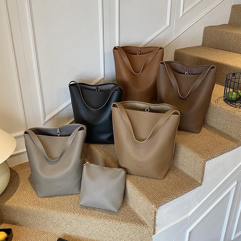 Retro casual bucket bag women's simple fashion shoulder bag large capacity sense high sense commuter messenger bag