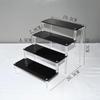 Black Acrylic Multi-Layer Display Stand for Model Figures, Bracelets, and Jewelry Storage.