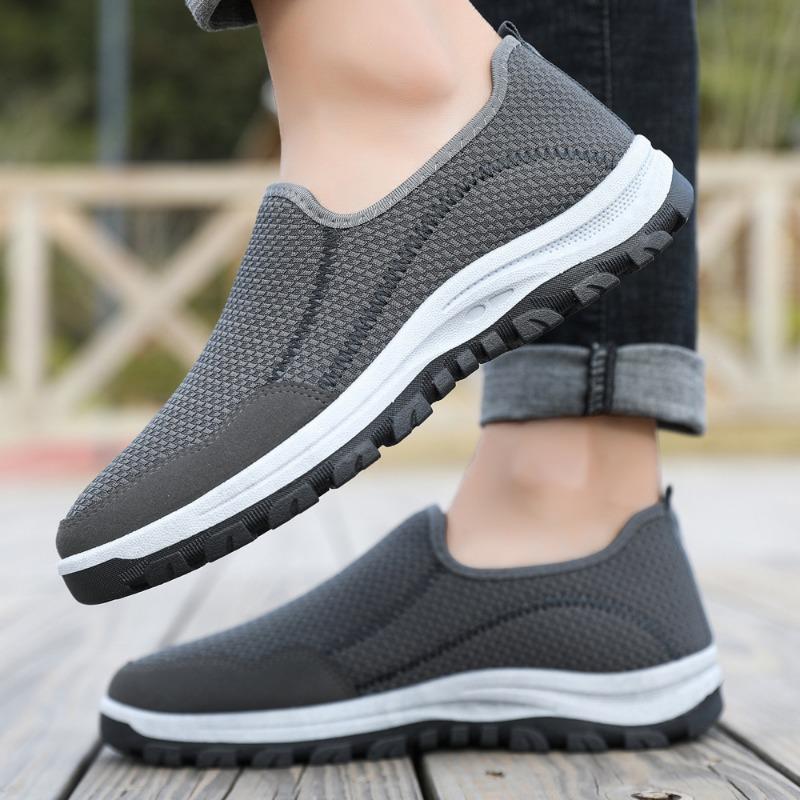 Casual shoes Spring flying woven surface breathable thick sole comfortable low top one pedal sports men's shoes