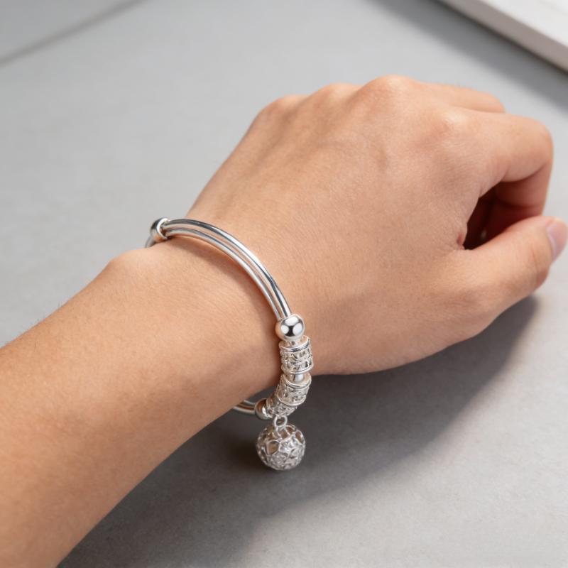 Beautiful and Fashionable Silver-plated Bell Bracelet Women European American Trendy Versatile Rotating Bead Bracelet Accessory