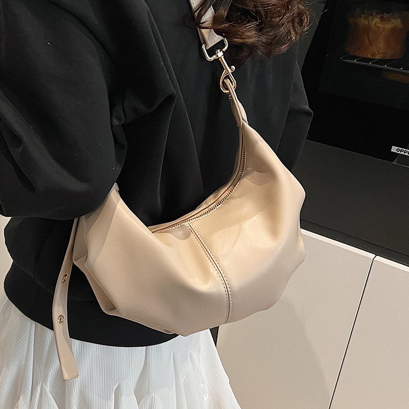 Frühling neues Produkt schlichte weiche Ledertextur Knödeltasche Nischendesign Pendler vielseitig lässige Umhängetasche für Damen
