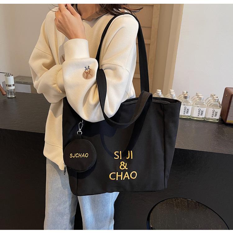 Women's Large-capacity Canvas Bag, Simple Letters, Versatile Commuting Artifact.