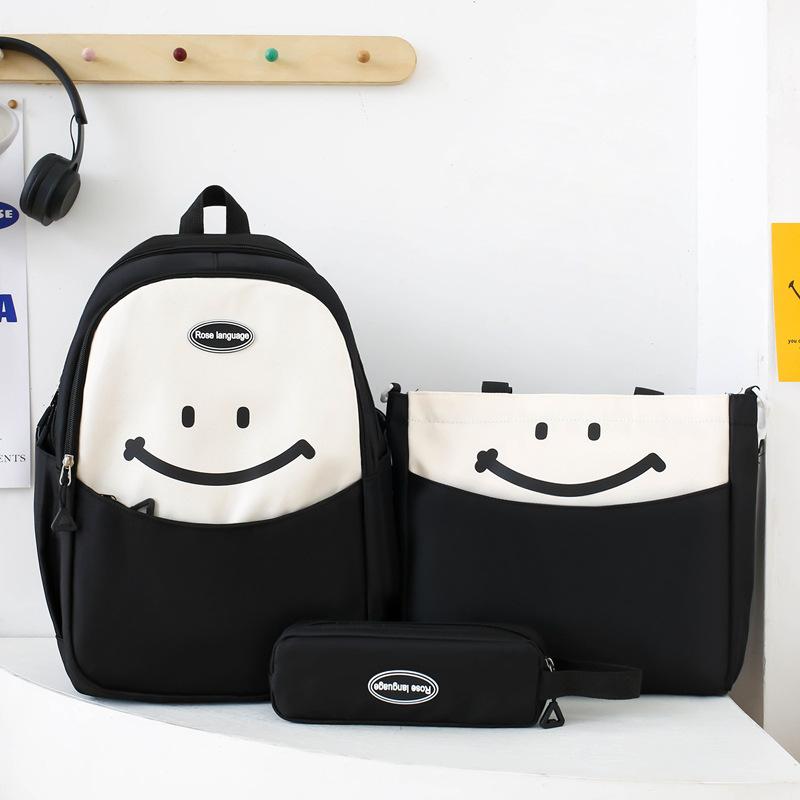 

High-value large-capacity schoolbag, junior high school and high school students contrasting colors smiley face backpack, lightweight backpack чорний