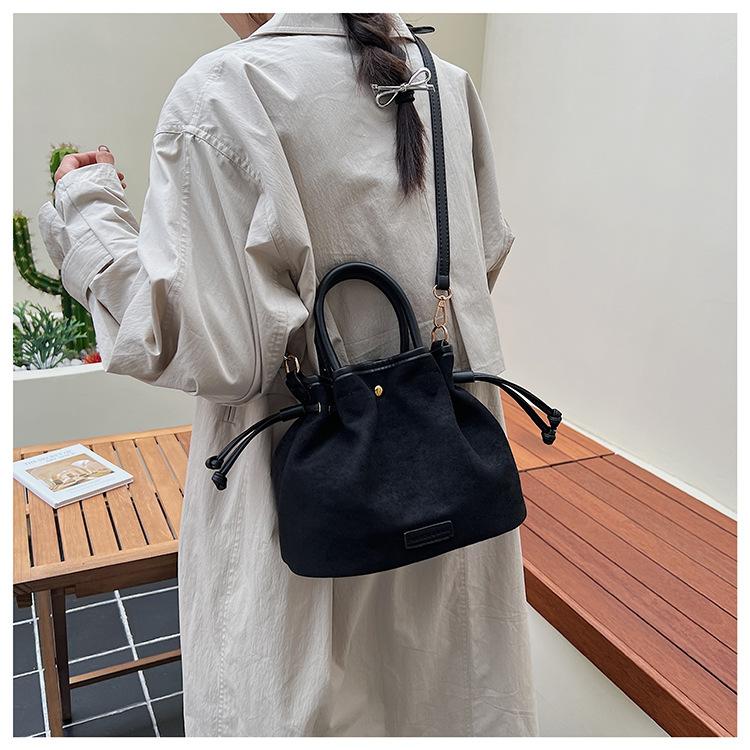 Suede bag women's autumn and winter drawstring pleated messenger bag high-end retro bucket bag