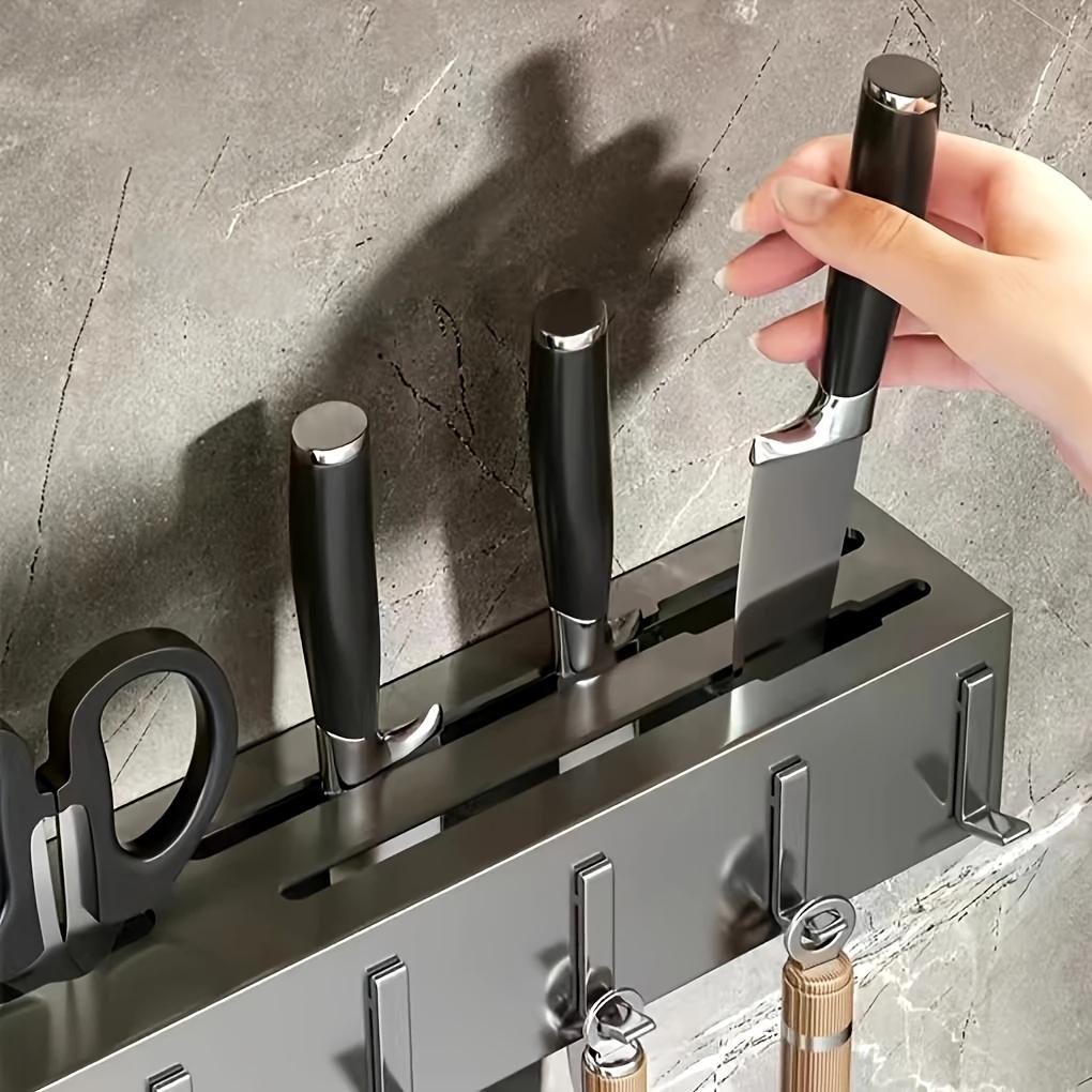 Stainless steel wall mounted tool holder without drilling, multifunctional kitchen storage rack with integrated chopstick cage.