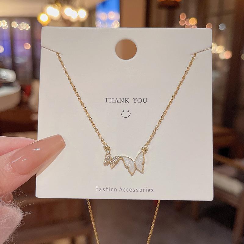 Light Luxury Niche Titanium Steel Necklace Women's Senior Design Sense Zircon Bow Clavicle Chain Neck Chain