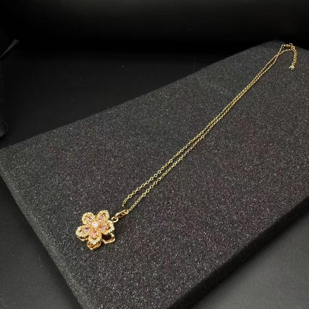 Collier tendance pour femme avec un pendentif floral rotatif Design minimaliste, parfait comme cadeau d'anniversaire