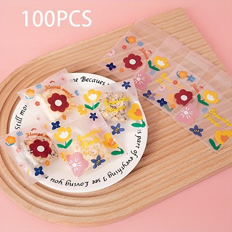 

1 комплект/100 шт. упаковочных пакетов для печенья с рисунком снежинки из клюквы, самоклеящийся пакет для печенья, прозрачный матовый пакет с милым цветком Pack of 100