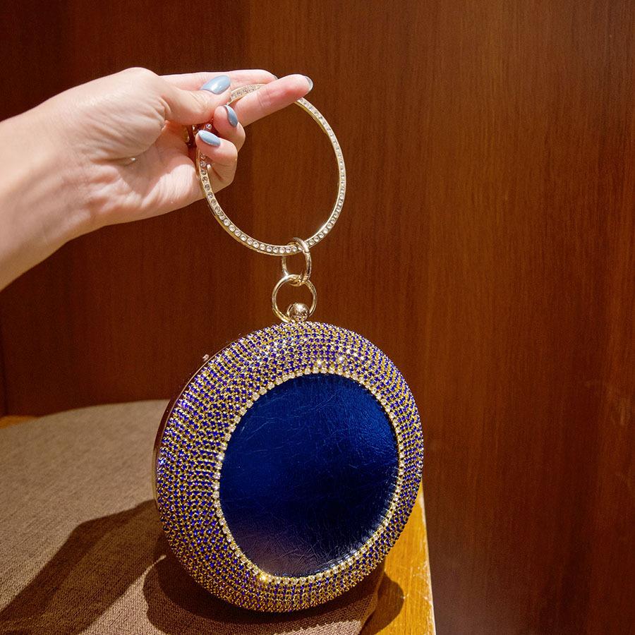 Luxury clutch bag, shiny rhinestone ring handbag, exquisite diamond-encrusted fashionable round bag.