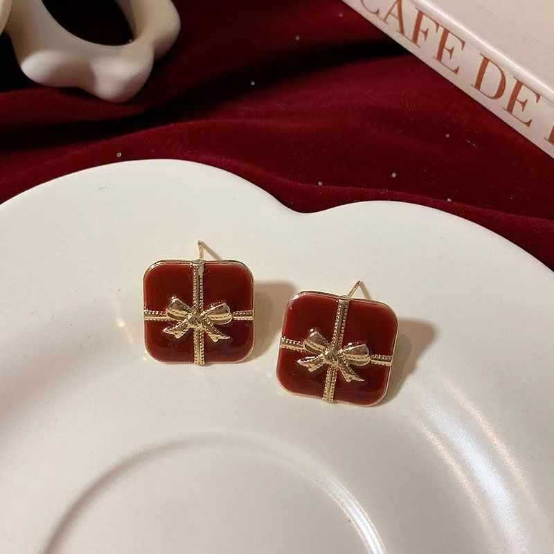 Maillard coffee color amber earrings women's autumn and winter high-end commuter style earrings light luxury niche design earrings