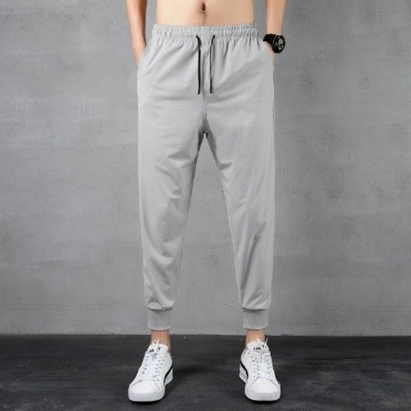 Men's sports casual pants summer trendy brand ice silk thin loose large size nine points tied feet trendy trousers