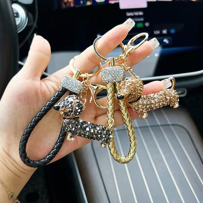 ארנקים למטבעות, פאוצ'ים ומחזיקים – מחזיקי מפתחות