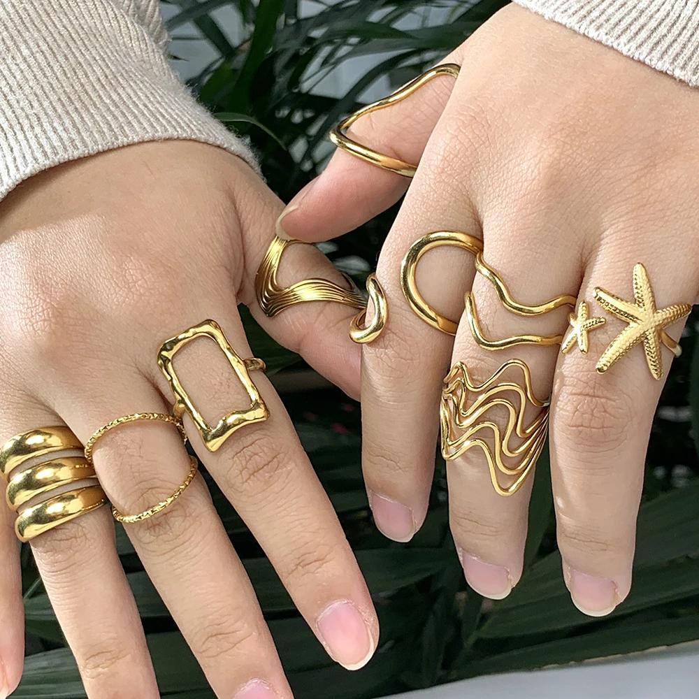 Europäische und amerikanische Damenringe aus Edelstahl, goldfarben und Zinklegierung, modischer, schlichter Stil, Zirkonia-Geschenk für Damen, Großhandel