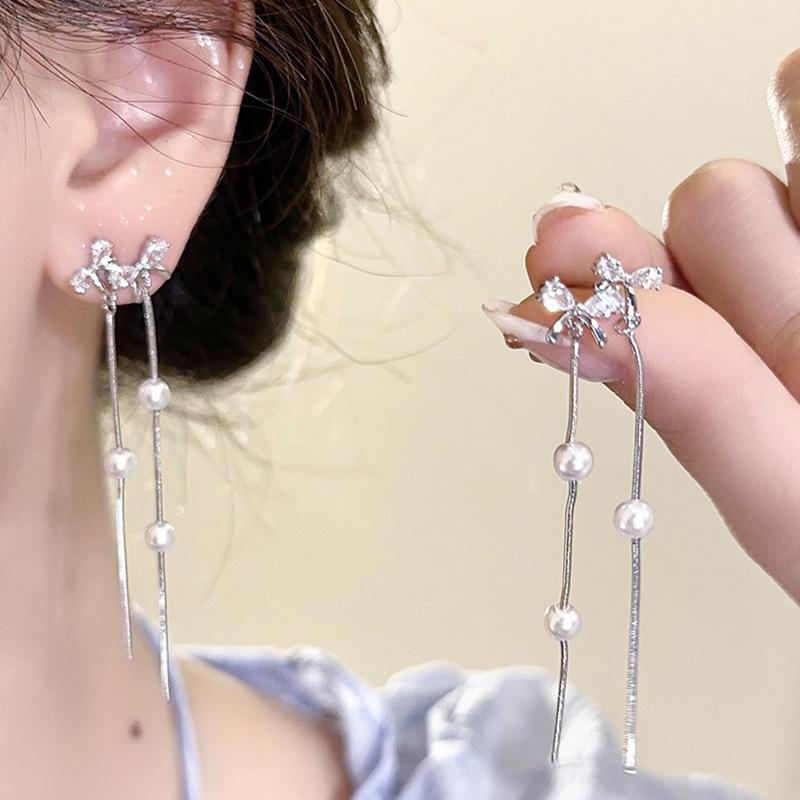 

Bow zircon earless ear clips pearl long fringed earrings temperament lady design mosquito coil disc earrings