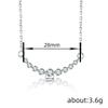 Curved smile pendant necklace, set with zircon stones